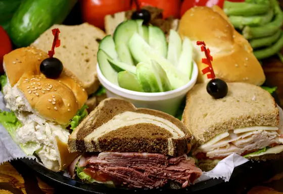 Cold cut sandwich and salad platter