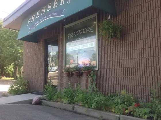 Fressers Delicatessen green awning and window boxes