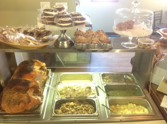 Fresh baked goods and hot trays in the deli case