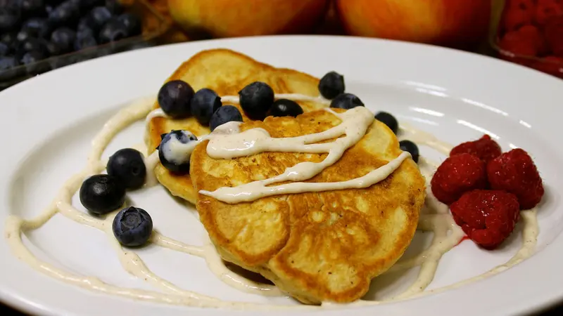 Blueberry pancakes with fresh berries